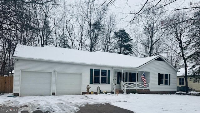 ranch-style house featuring a garage