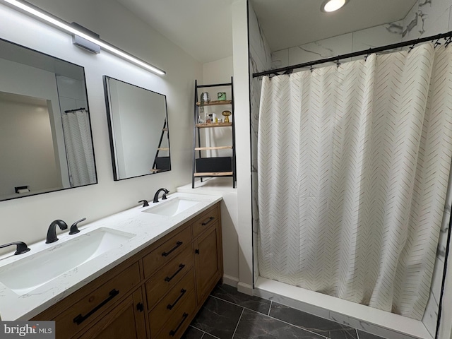 bathroom featuring vanity, tile patterned floors, and curtained shower