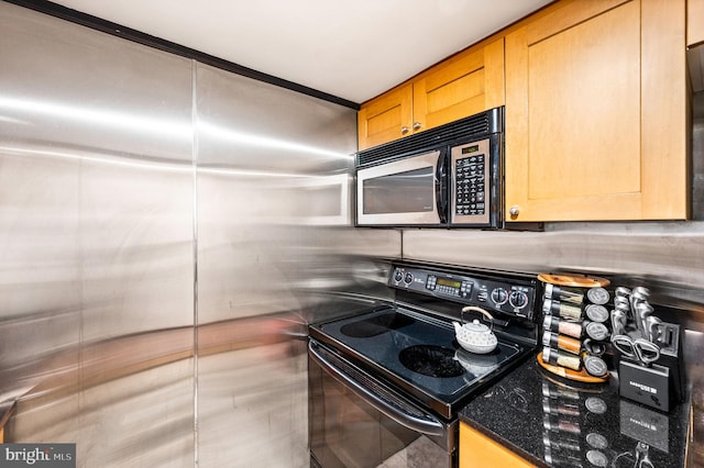 kitchen with black range with electric stovetop