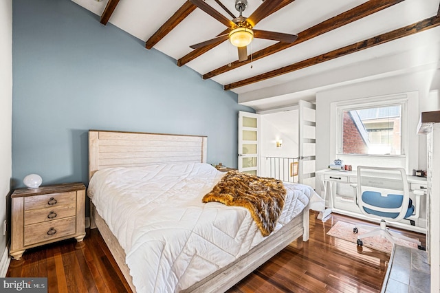 bedroom with lofted ceiling with beams, ceiling fan, and dark wood-type flooring