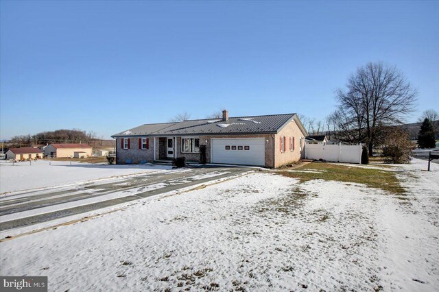 view of front of home featuring a garage