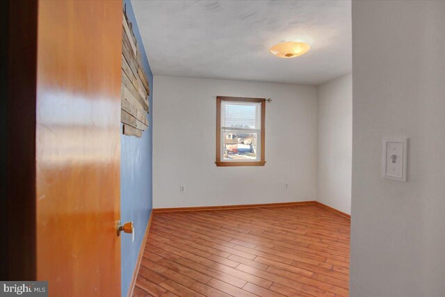 empty room featuring light hardwood / wood-style floors