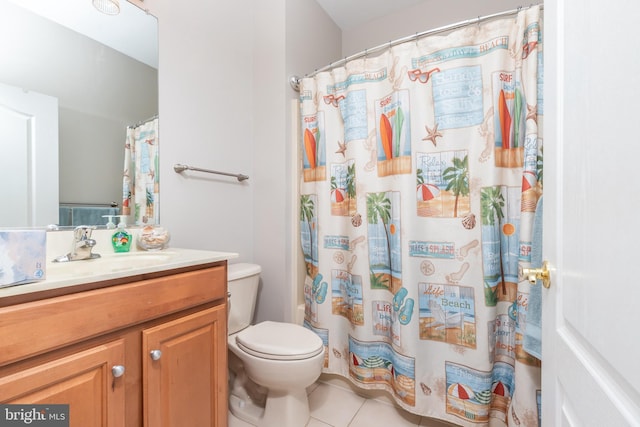 bathroom featuring tile patterned flooring, vanity, curtained shower, and toilet