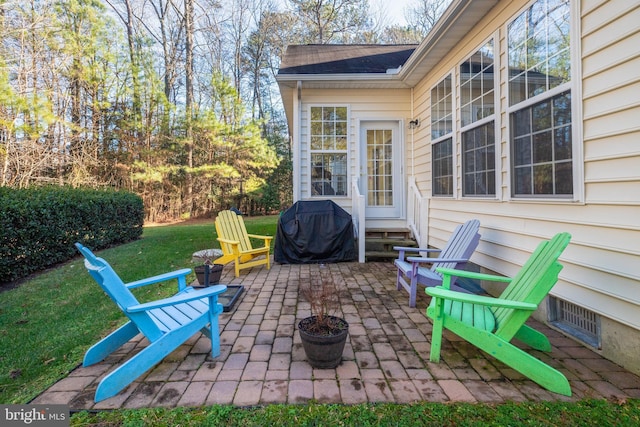 view of patio with a grill