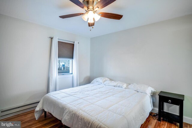 1427 Paul Blvd, Manahawkin, NJ 08050 - bedroom with a ceiling fan, wood finished floors, and a baseboard radiator