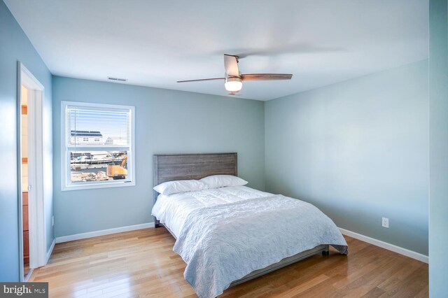 1427 Paul Blvd, Manahawkin, NJ 08050 - bedroom featuring a ceiling fan, baseboards, and wood finished floors