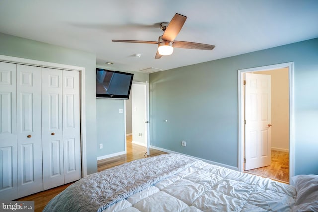1427 Paul Blvd, Manahawkin, NJ 08050 - bedroom featuring a ceiling fan, wood finished floors, a closet, and baseboards