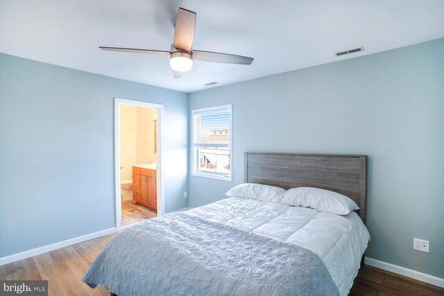 1427 Paul Blvd, Manahawkin, NJ 08050 - bedroom featuring visible vents, baseboards, wood finished floors, and a ceiling fan