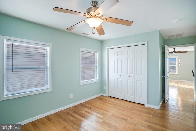 1427 Paul Blvd, Manahawkin, NJ 08050 - unfurnished bedroom with light wood-style flooring, baseboards, visible vents, and a closet