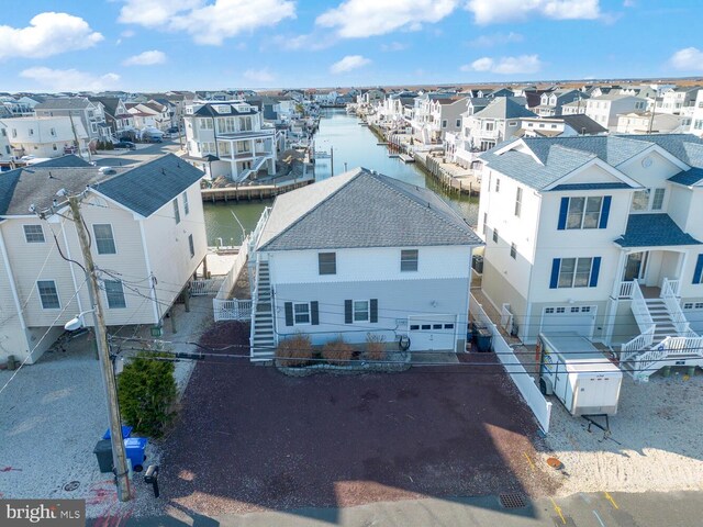 1427 Paul Blvd, Manahawkin, NJ 08050 - drone / aerial view featuring a residential view and a water view