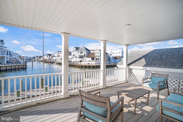 1427 Paul Blvd, Manahawkin, NJ 08050 - wooden terrace featuring a water view and a residential view