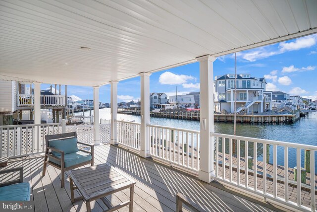 1427 Paul Blvd, Manahawkin, NJ 08050 - wooden terrace featuring a water view and a residential view