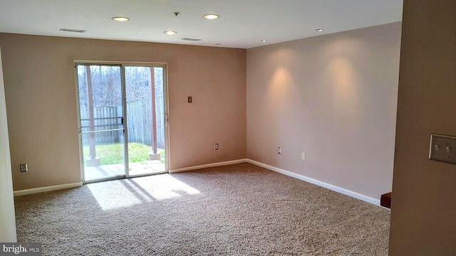 view of carpeted spare room