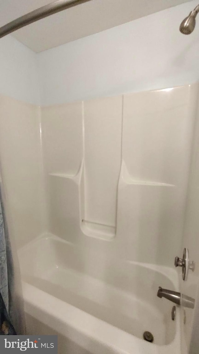 bathroom featuring tub / shower combination