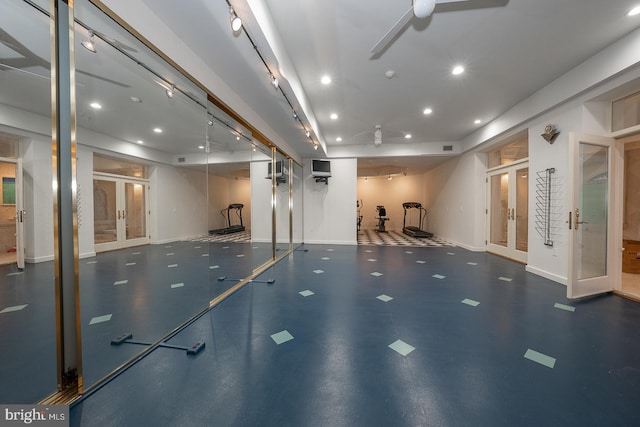 interior space with baseboards, french doors, a ceiling fan, and recessed lighting