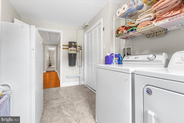 washroom featuring separate washer and dryer