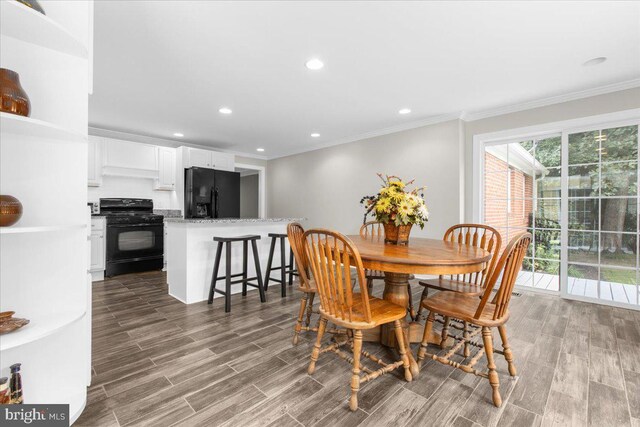 dining room featuring ornamental molding