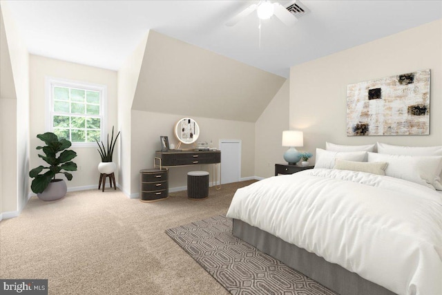 bedroom with carpet, ceiling fan, and vaulted ceiling