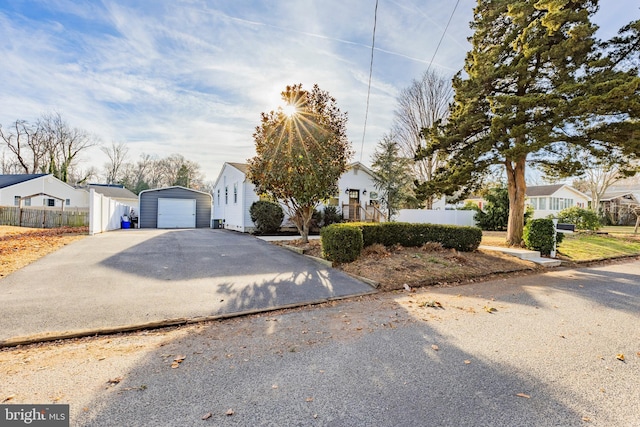 view of front of home with an outbuilding and a garage