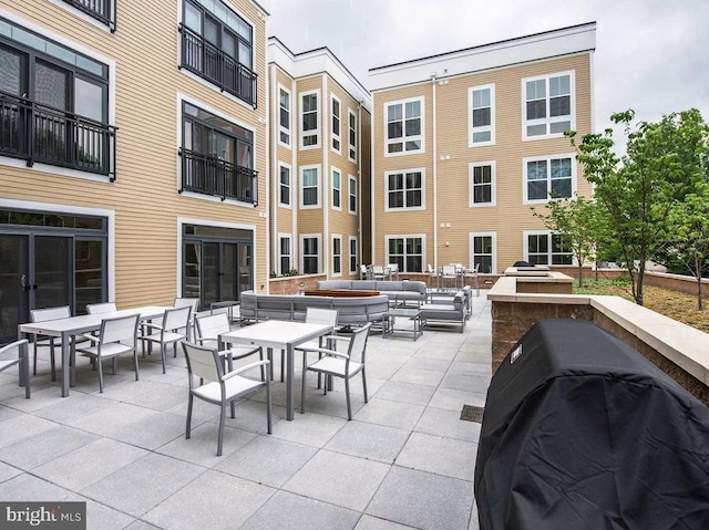 view of patio / terrace featuring a grill and outdoor lounge area