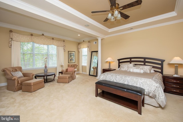 carpeted bedroom with decorative columns, ceiling fan, and crown molding