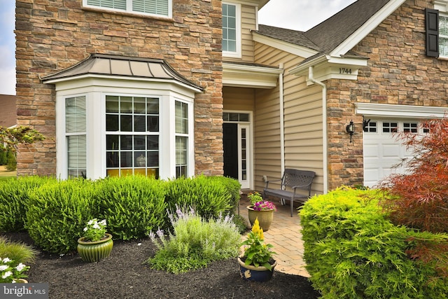 entrance to property with a garage