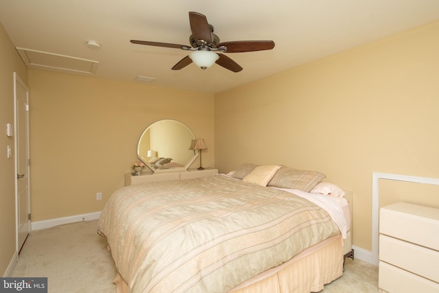 bedroom with ceiling fan and light colored carpet