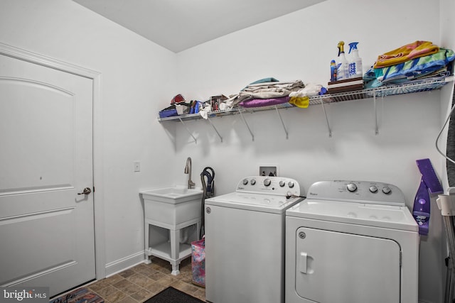 washroom featuring separate washer and dryer