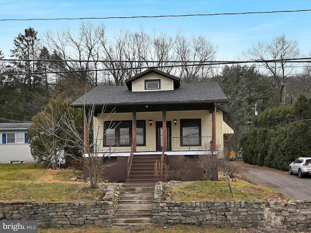 bungalow-style home with a porch