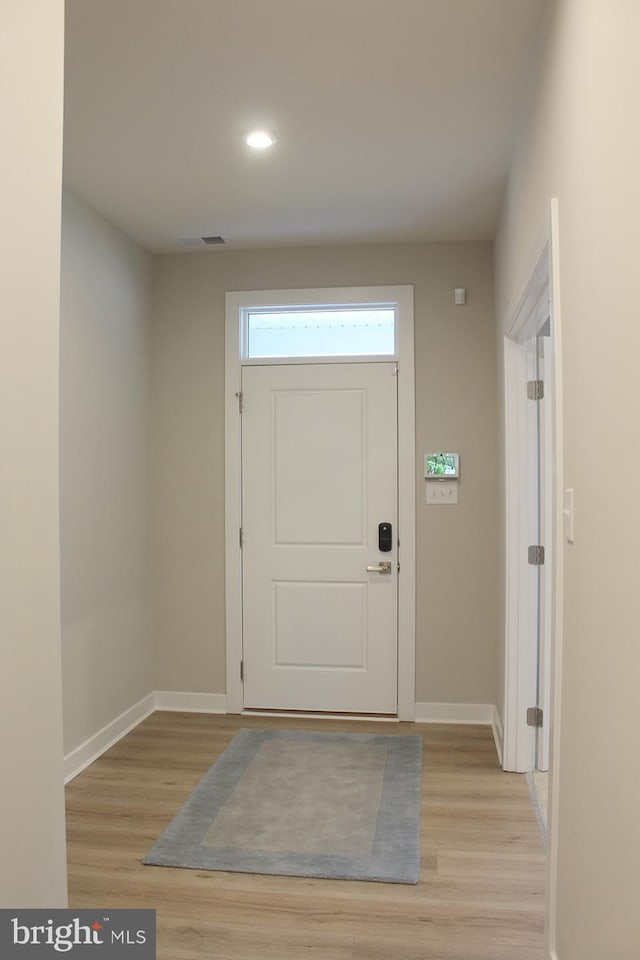 doorway featuring light hardwood / wood-style flooring