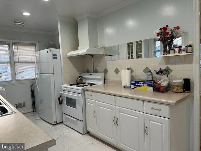 kitchen with crown molding, extractor fan, white appliances, decorative backsplash, and white cabinets