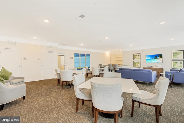 view of carpeted dining space