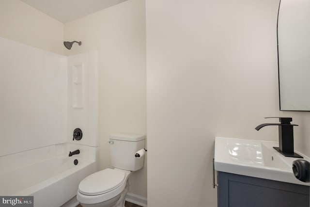 full bathroom featuring vanity, shower / bath combination, and toilet