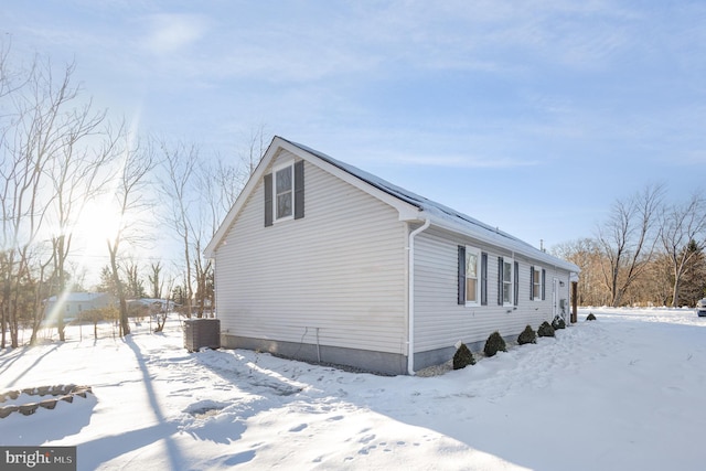 view of snow covered property