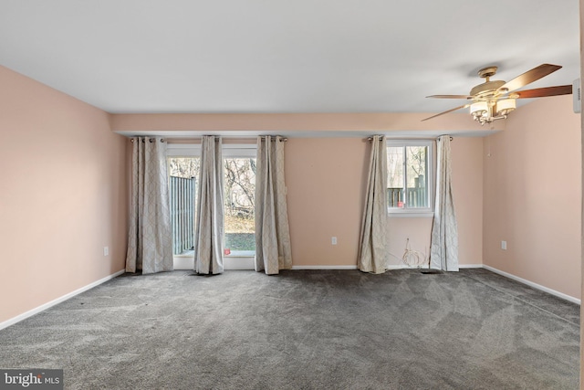 carpeted empty room with ceiling fan