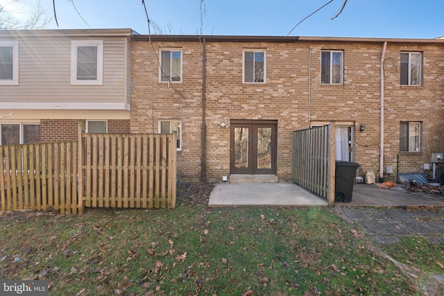 back of property with french doors