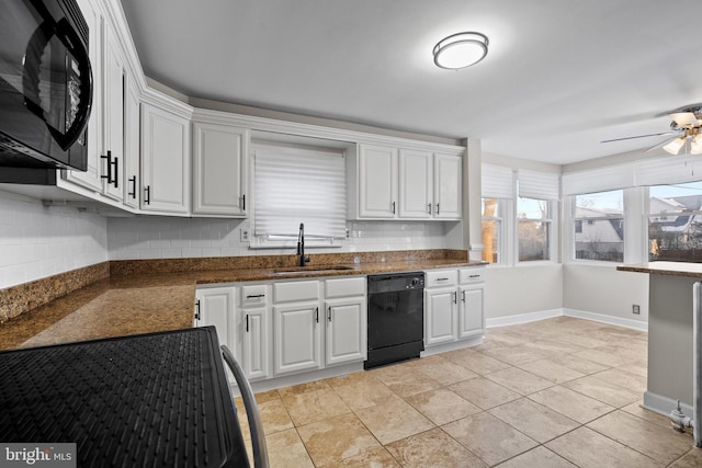 kitchen featuring light tile patterned flooring, sink, white cabinets, and black appliances