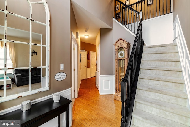 stairway featuring hardwood / wood-style floors