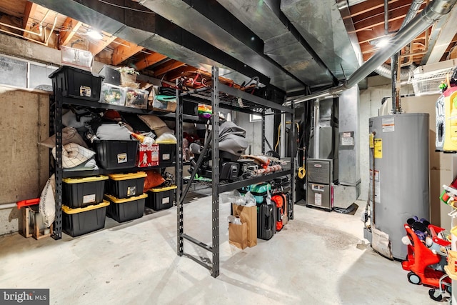 basement with heating unit and gas water heater