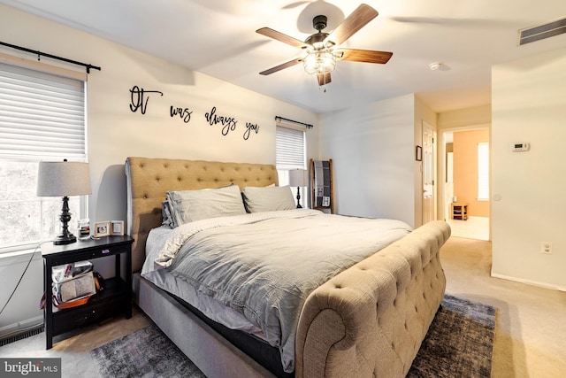 bedroom featuring ceiling fan and carpet floors