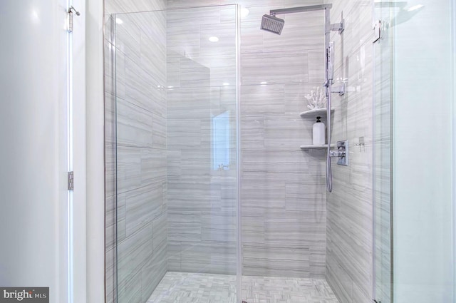 bathroom featuring an enclosed shower