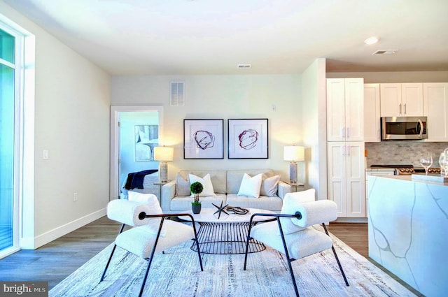 living room featuring dark hardwood / wood-style floors