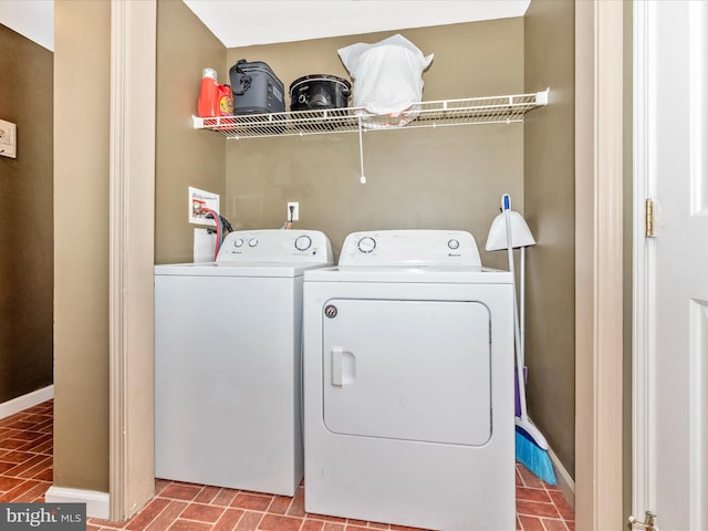 laundry area featuring washing machine and dryer