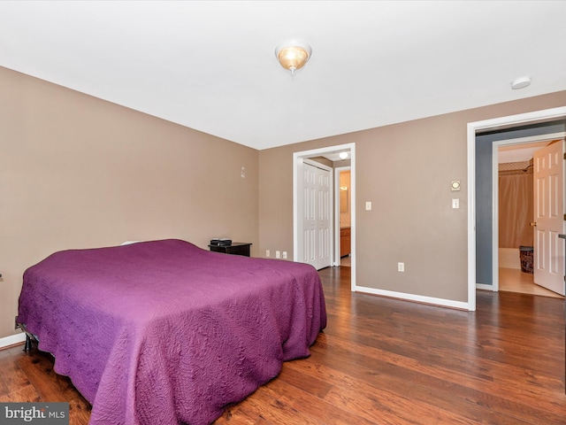 bedroom featuring dark wood-type flooring