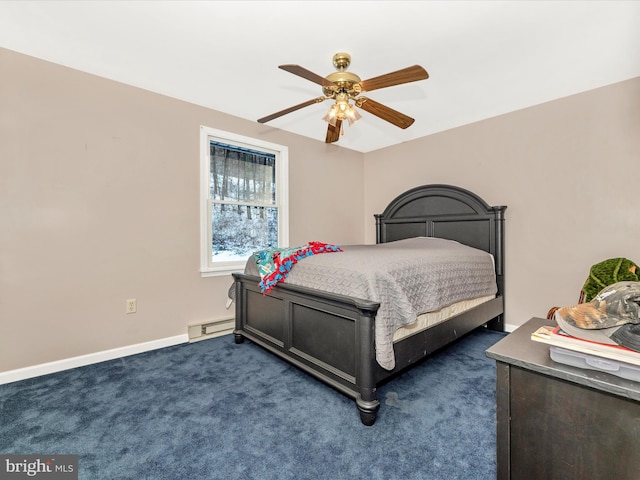 carpeted bedroom featuring ceiling fan and a baseboard heating unit