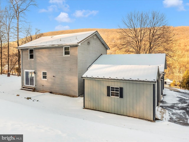 view of snow covered property