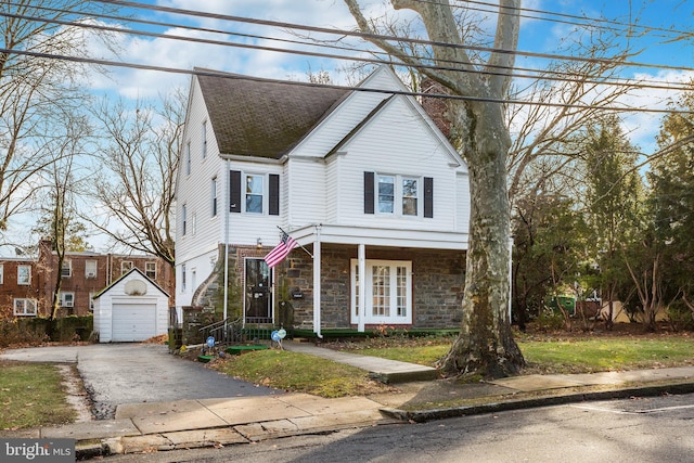 view of front of house with an outbuilding and a garage