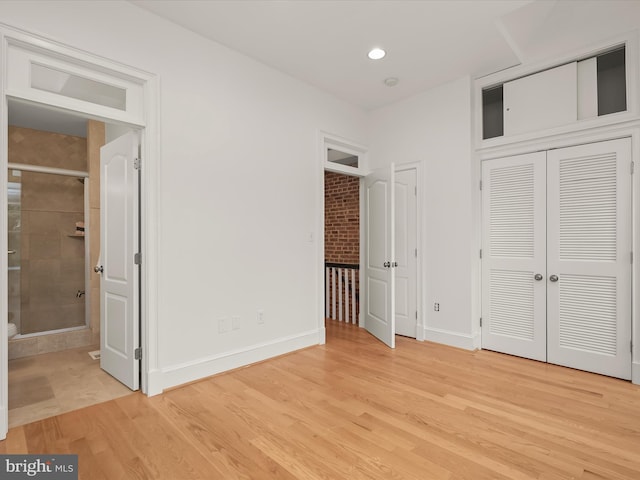 unfurnished bedroom featuring light hardwood / wood-style floors