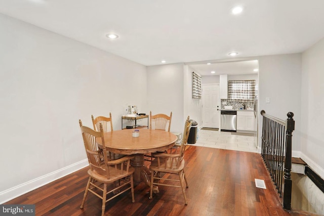 dining room featuring light wood-type flooring