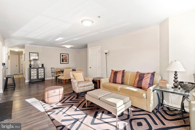 living area with dark wood finished floors and baseboards